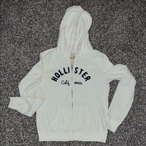 Hollister Cream Zip Hoodie with Navy Lettering